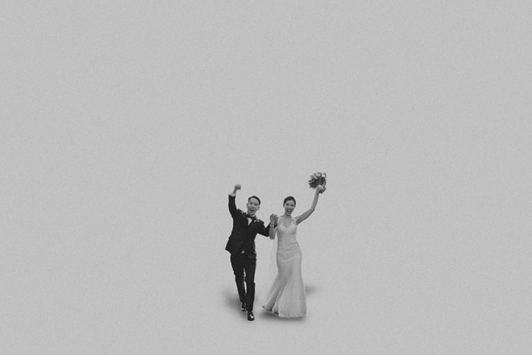 Joanne and Aric celebrate after their Empress Singapore church wedding photography.