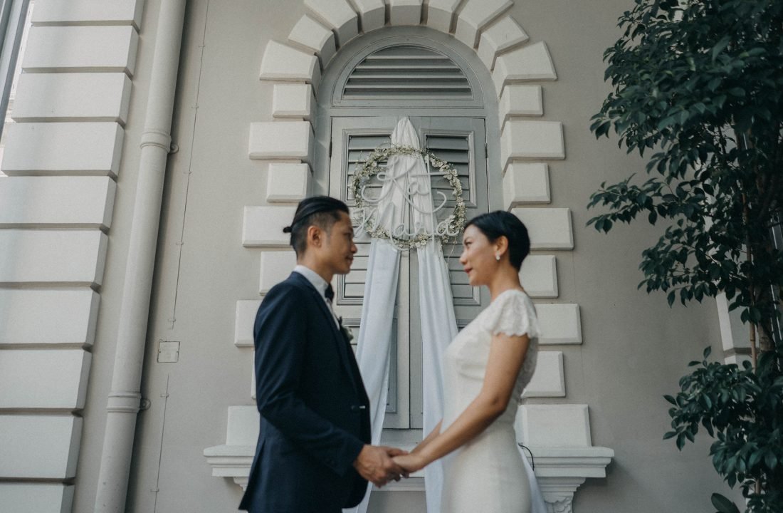 portrait of a couple at flutes located in national museum of singapore