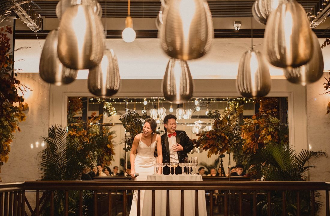 bride and groom laughing during a moment at their alkaff mansion wedding by a singapore photographer