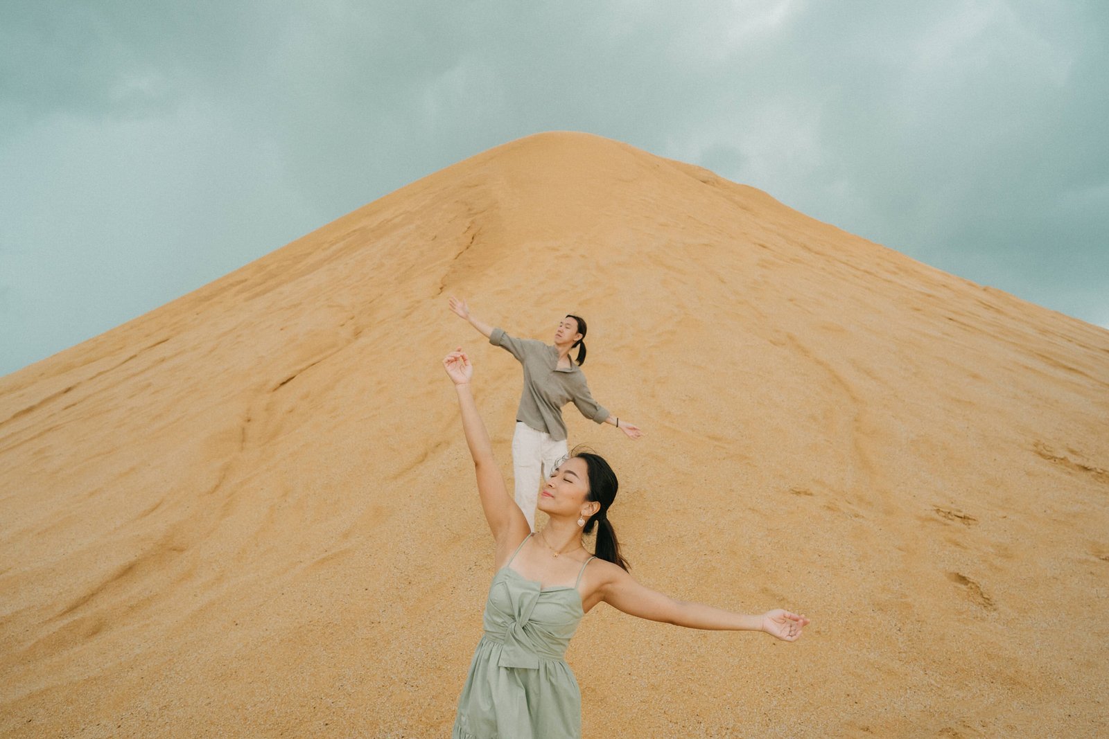 Romantic shot across sand dunes in Bintan prewedding photography