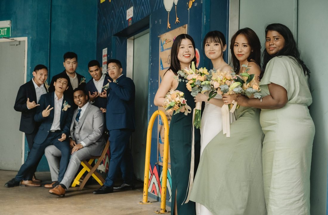 Wedding party posing for the outset Singapore wedding photography.