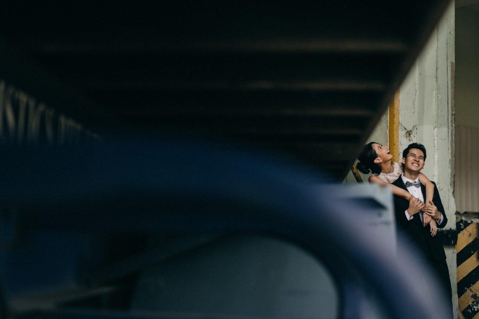 Couple sharing a laughter during their prewedding captured by Singapore wedding Photographer