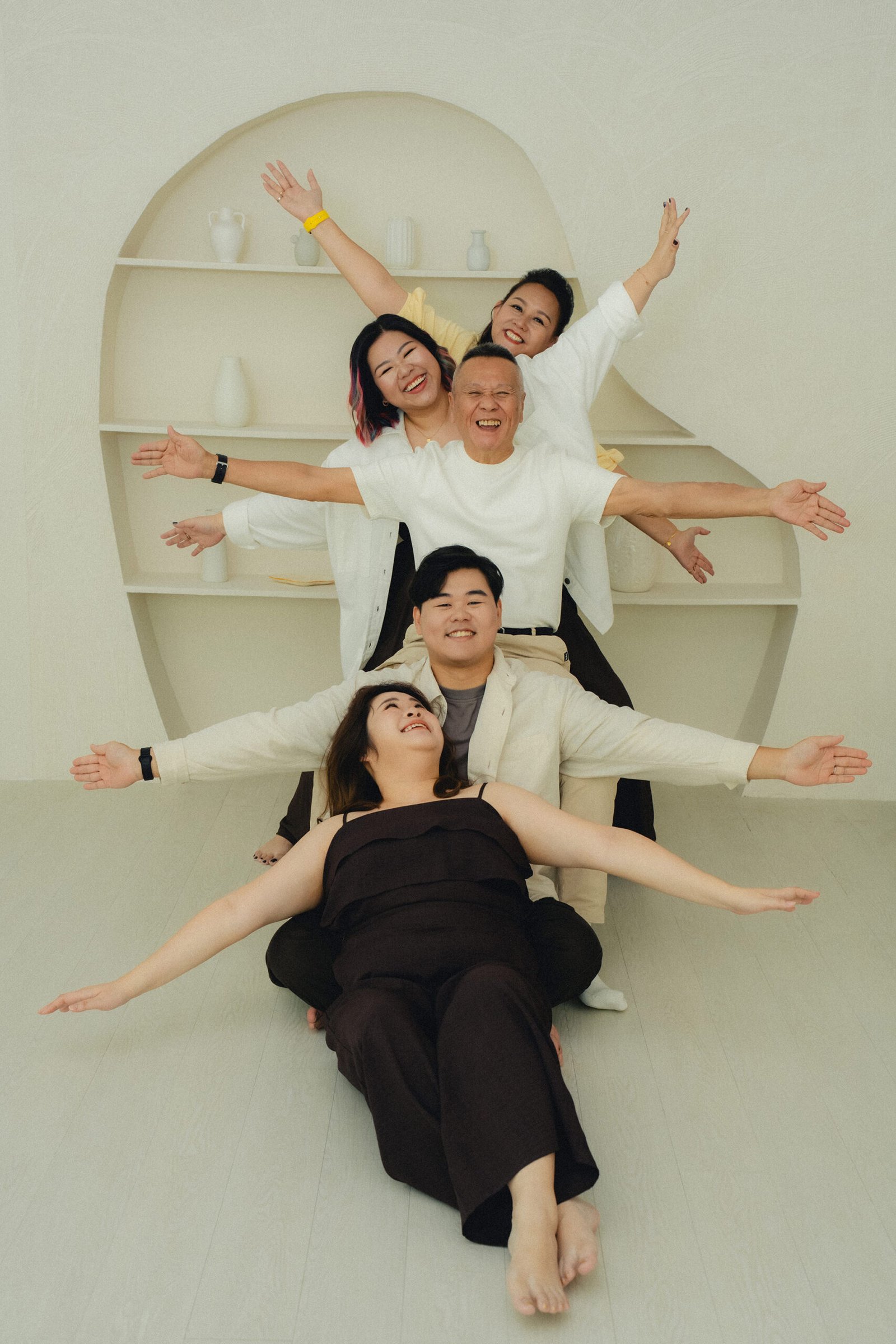 Fun and energetic family photoshoot at Studio 19 Singapore with natural expressions