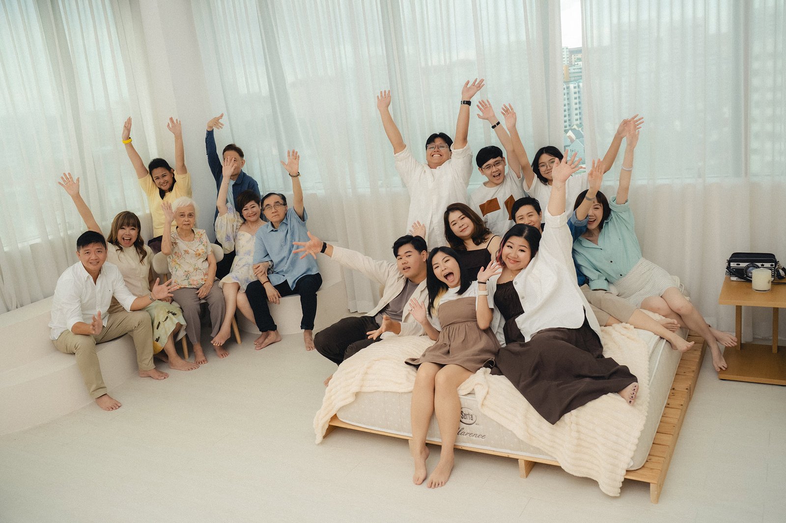 Playful family moment at Studio 19 Singapore featuring the Han family and their cheerful grandma