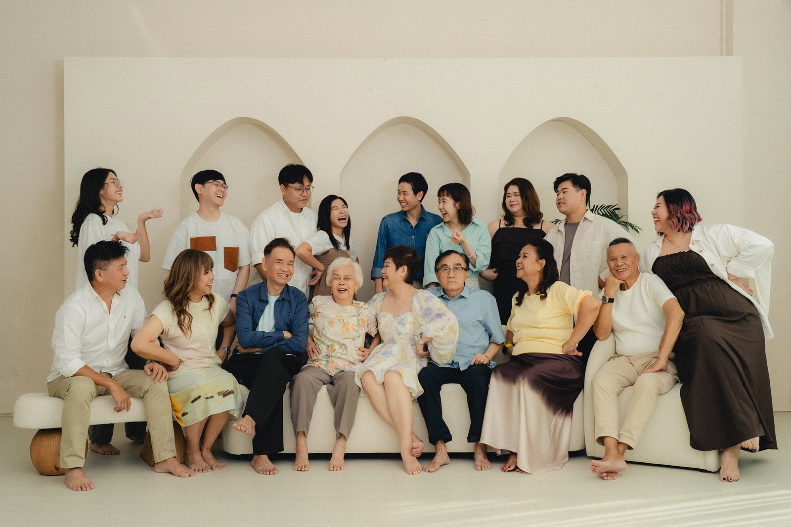 Fun and energetic family photoshoot at Studio 19 Singapore with kids, parents, and grandma