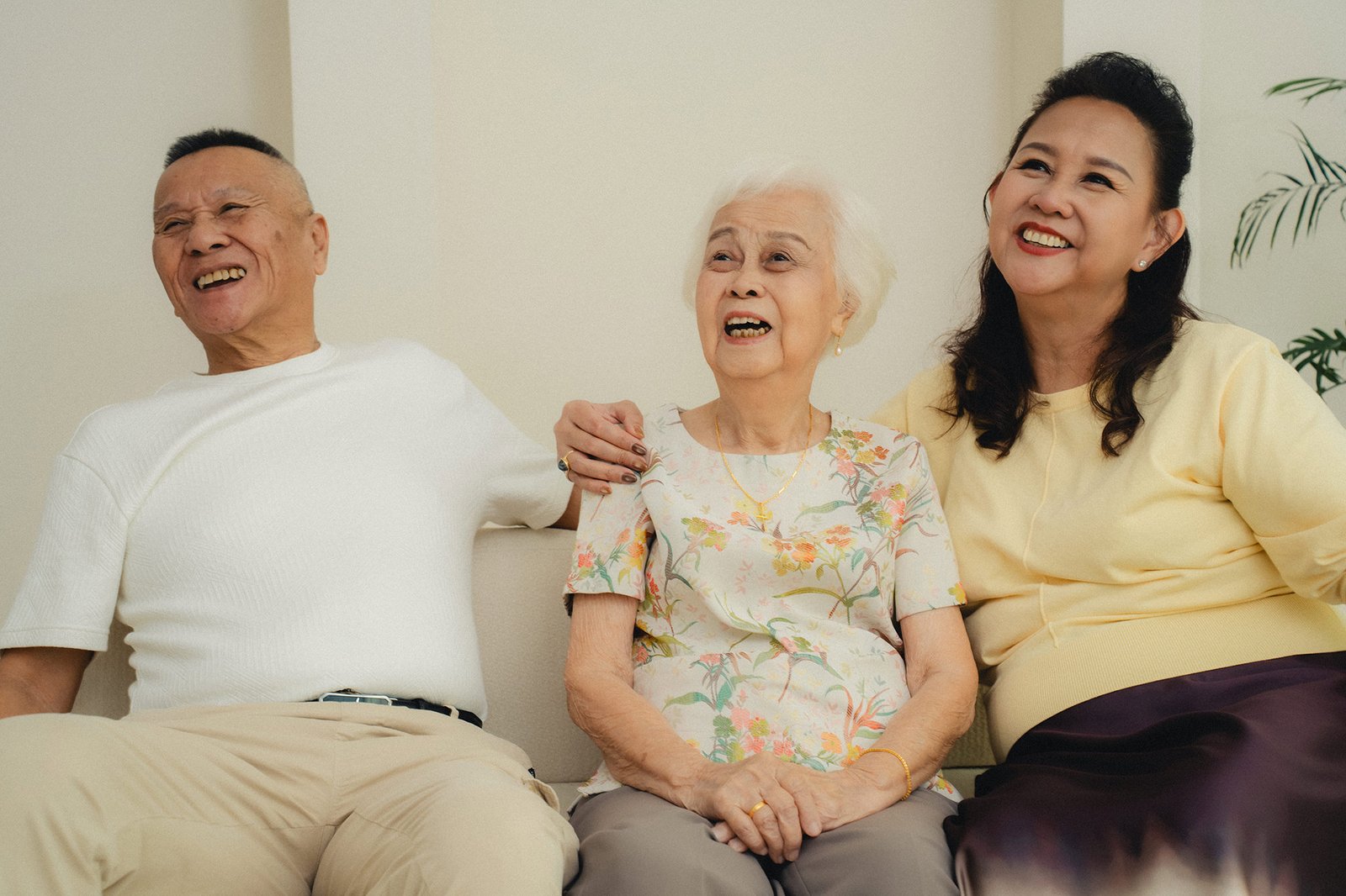 Candid interaction between family members during a Studio 19 Singapore family shoot