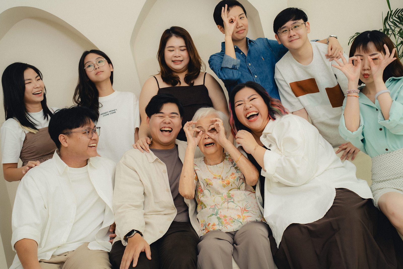 Singapore family photographer capturing joyful Han family moments with grandma at Studio 19