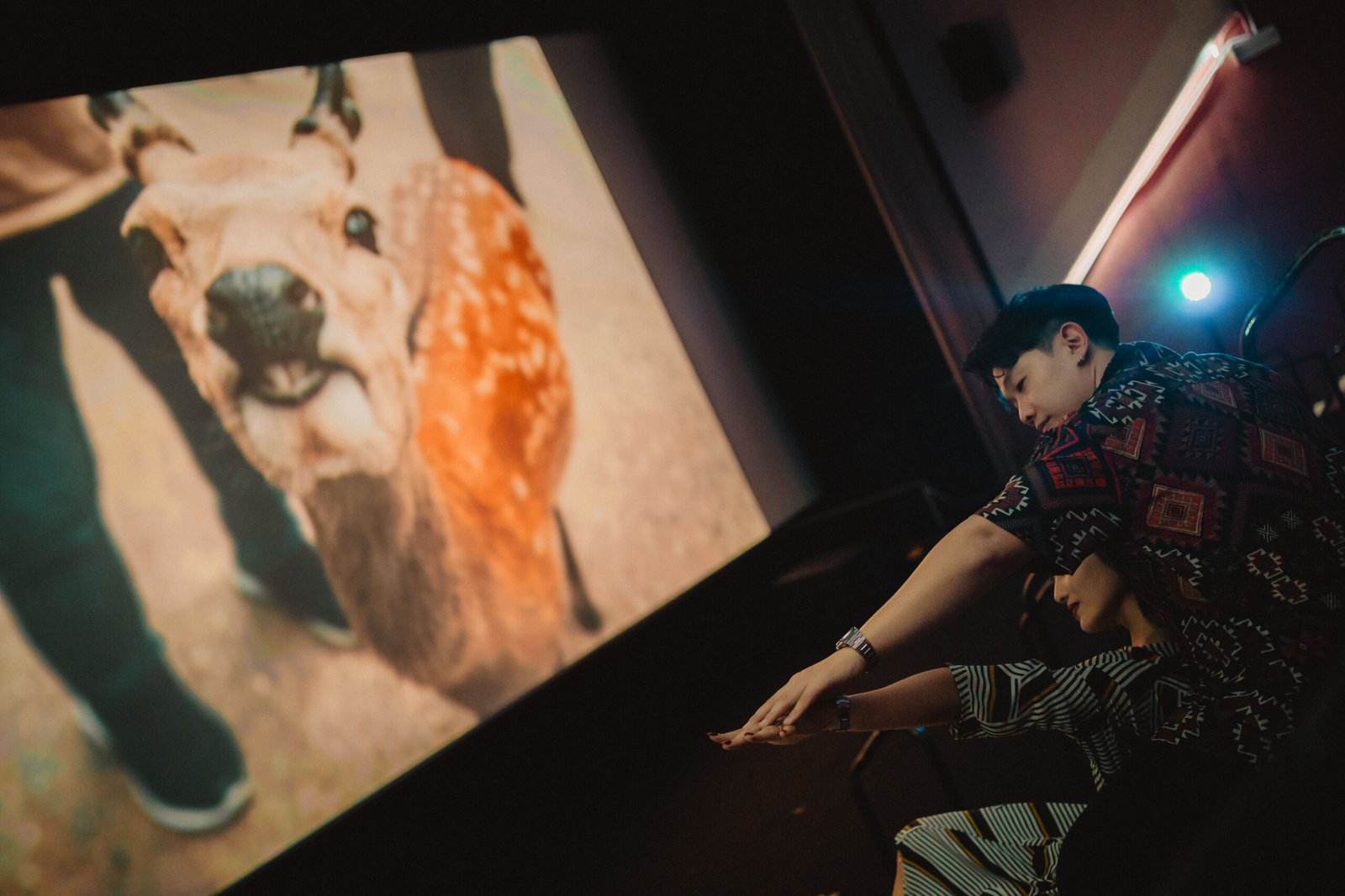 Singapore wedding photographer capturing a couple prewedding at golden mile projector