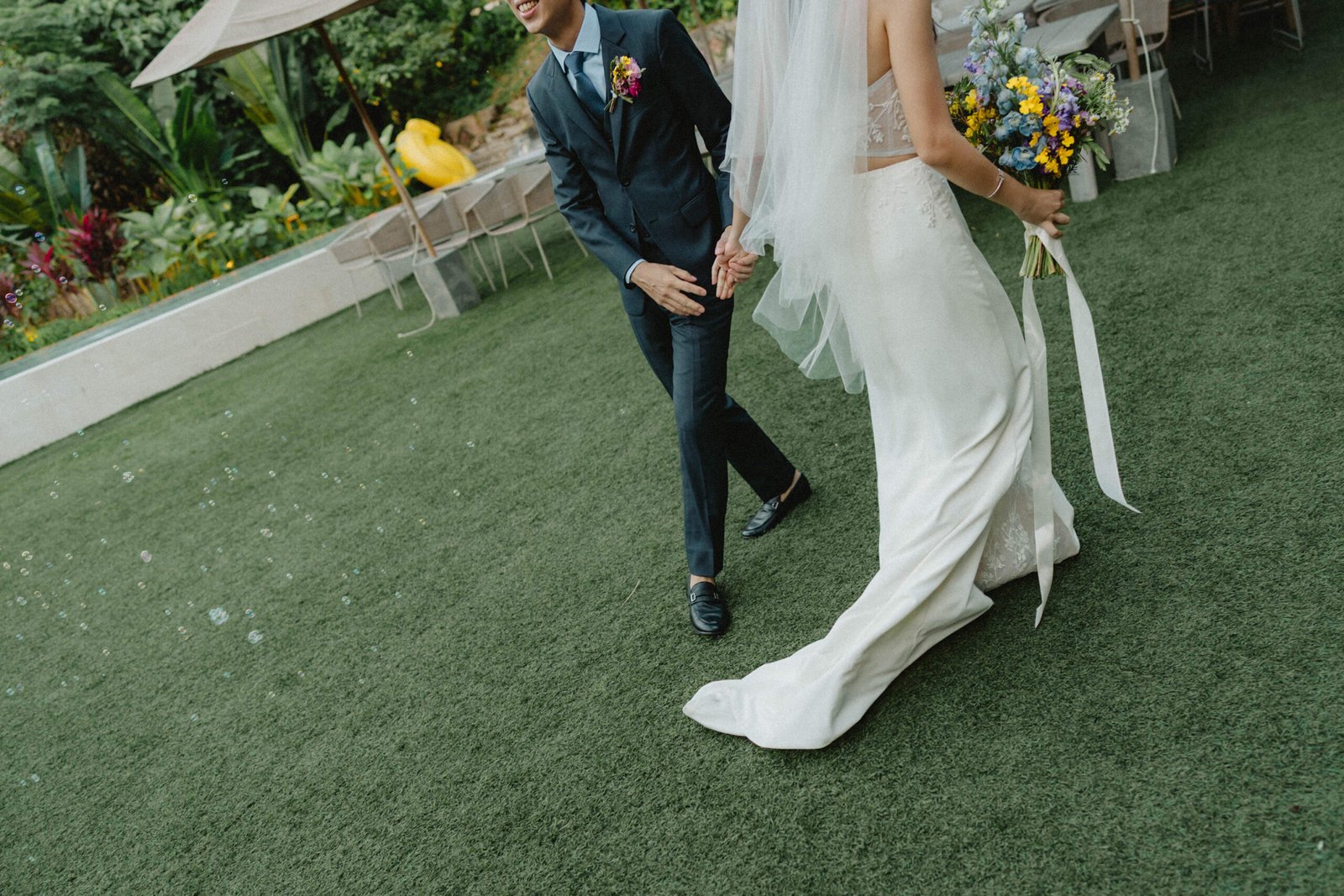 Bride and groom walking, wedding photography packages Singapore