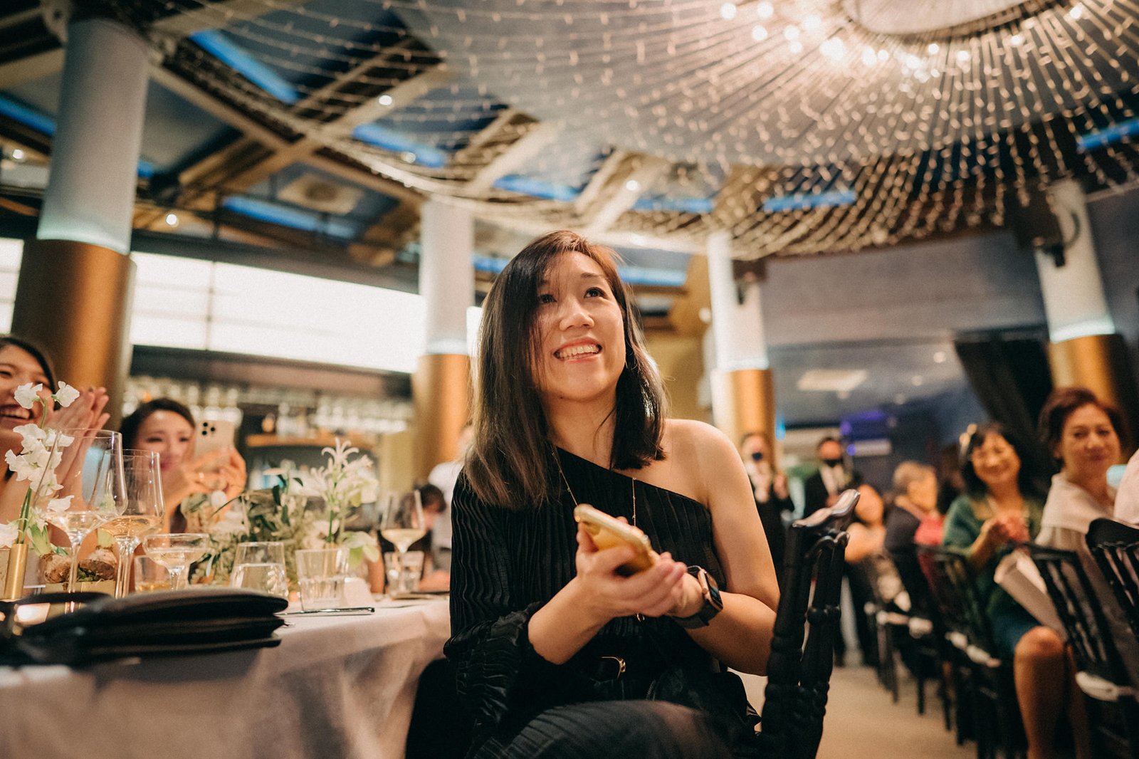 Guest enjoying food at a wedding reception in Singapore at 1-pavilion