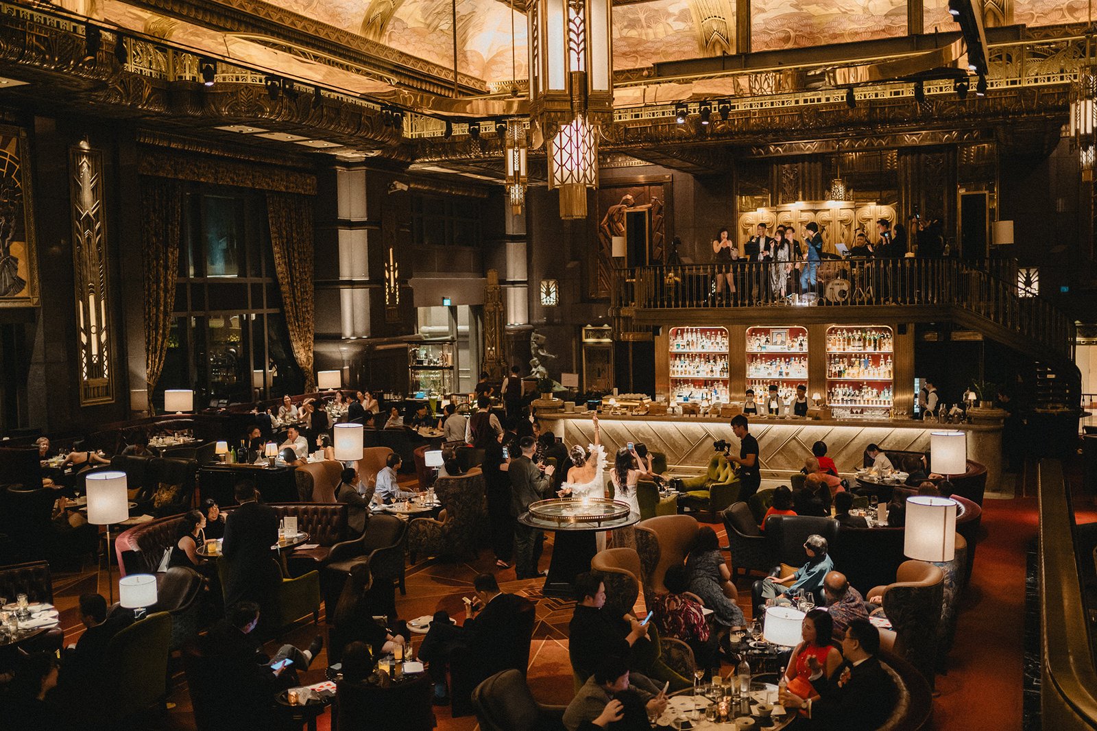 Elegant Atlas Bar Singapore wedding reception with guests and live band.