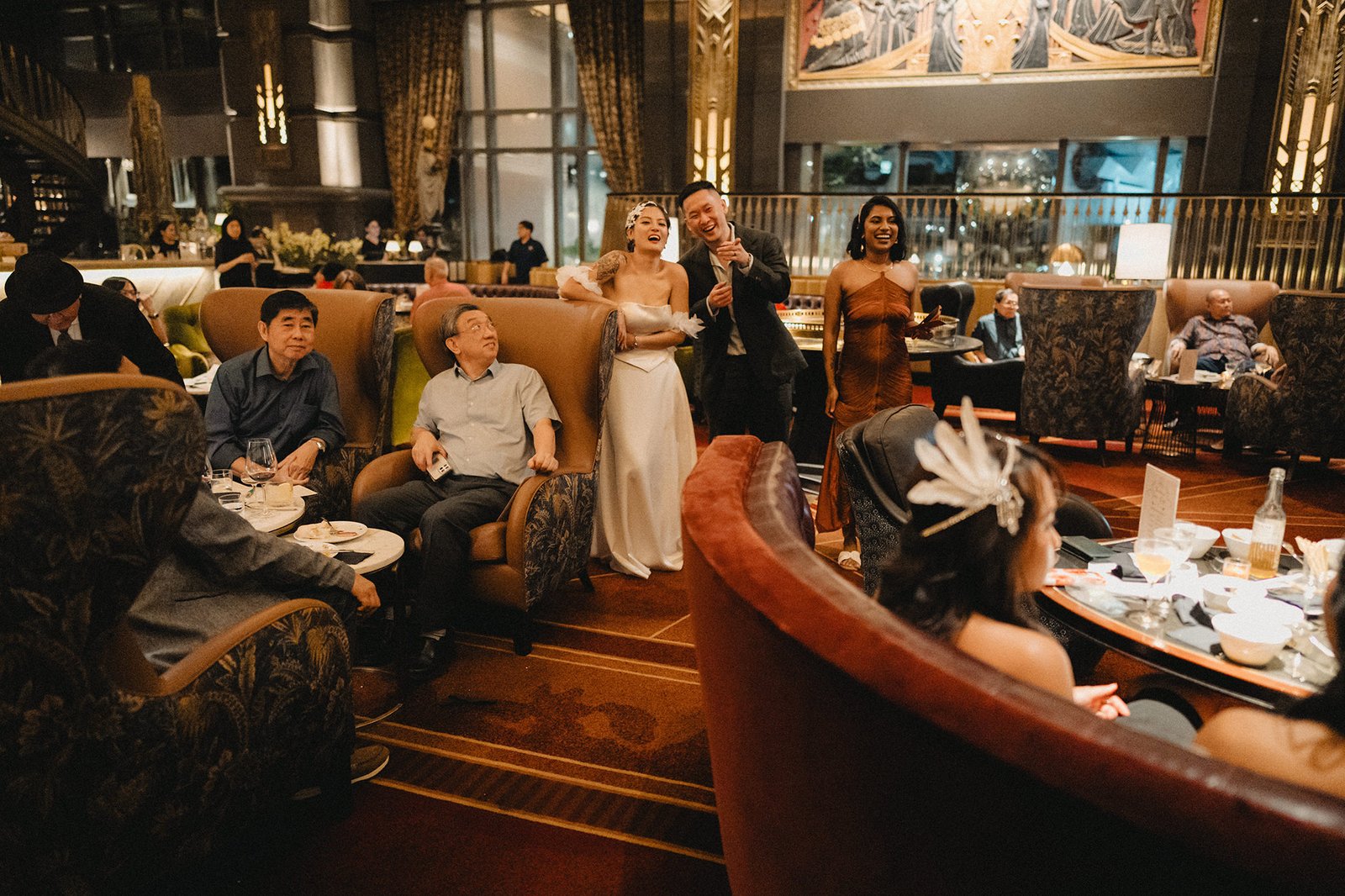 Jared and Xinyu celebrate their Atlas Bar Singapore wedding with guests.