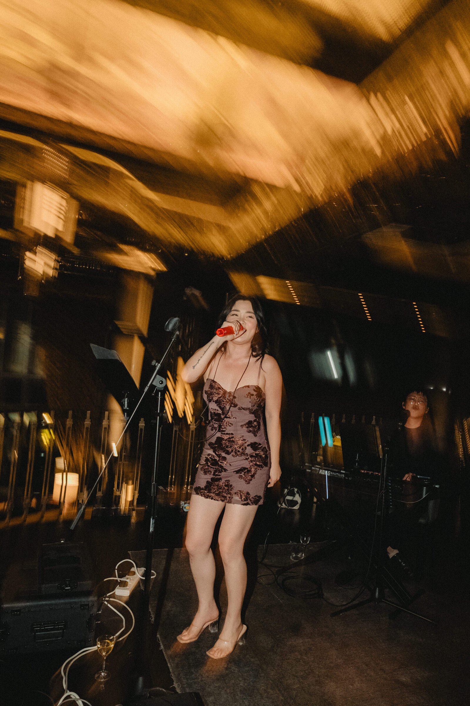 Singer performing at Atlas Bar Singapore wedding reception