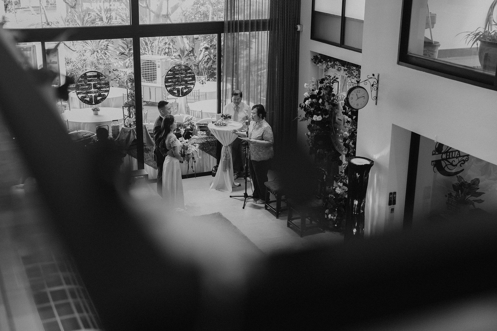 Jared and Xinyu's Atlas Bar Singapore wedding ceremony with guests.