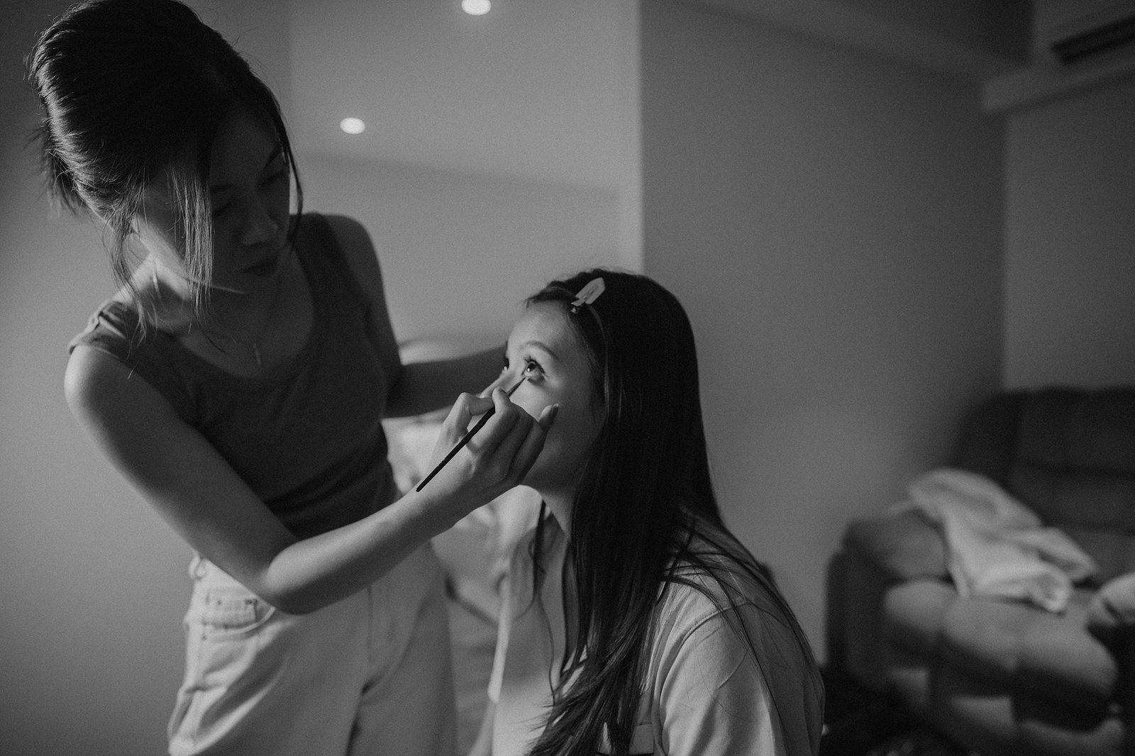Bride getting makeup done at Atlas Bar Singapore wedding