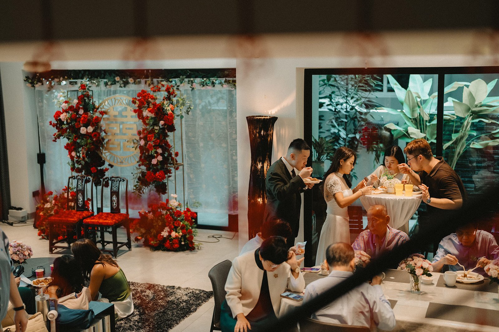 Jared and Xinyu's wedding reception at Atlas Bar Singapore, guests dining.