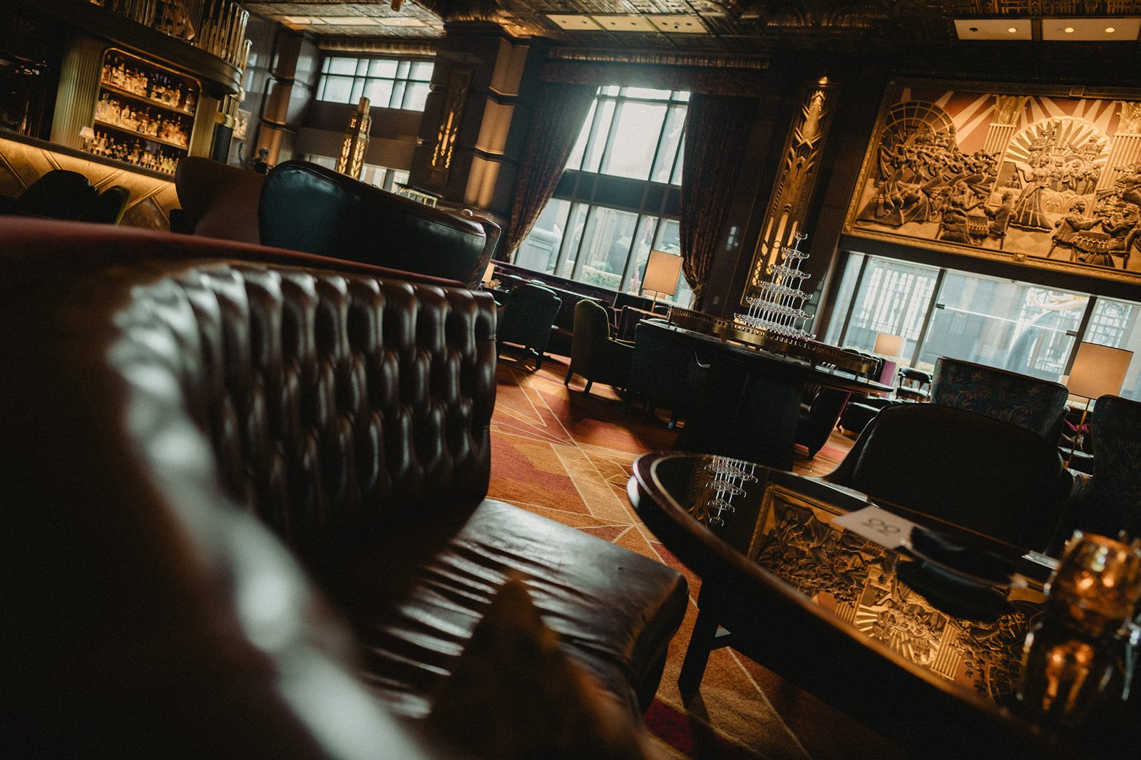 Elegant Atlas Bar Singapore interior with plush seating and ornate decor, ideal for a wedding.