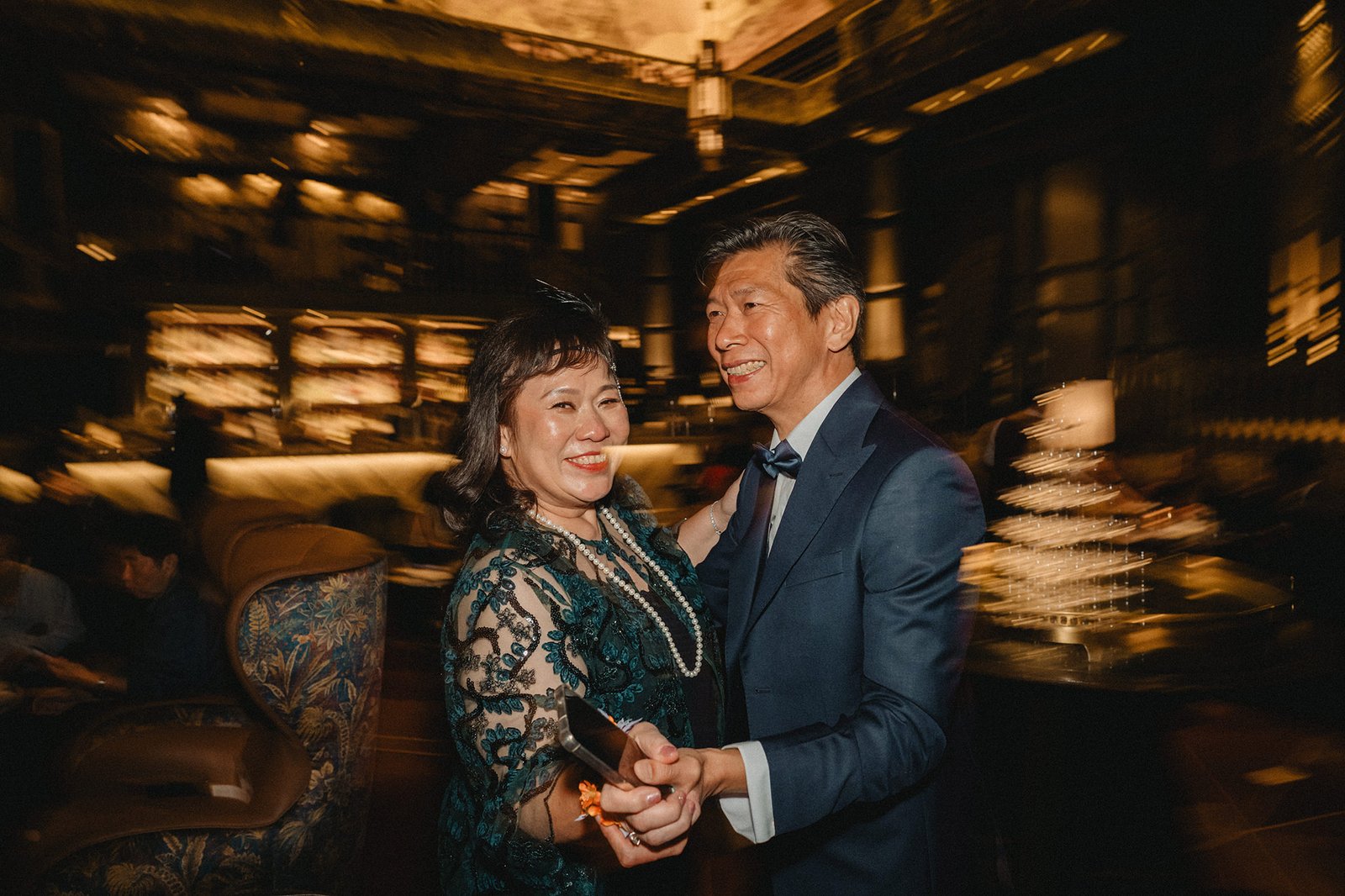 Jared and Xinyu dance at their Atlas Bar Singapore wedding reception.