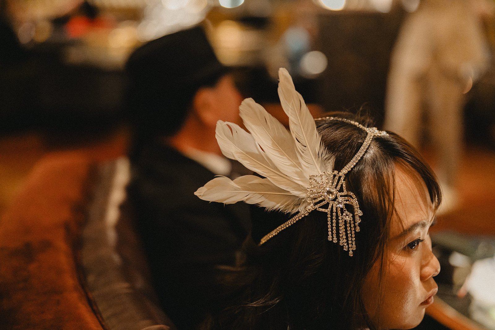 Jared and Xinyu's wedding at Atlas Bar Singapore: bride with feather headband
