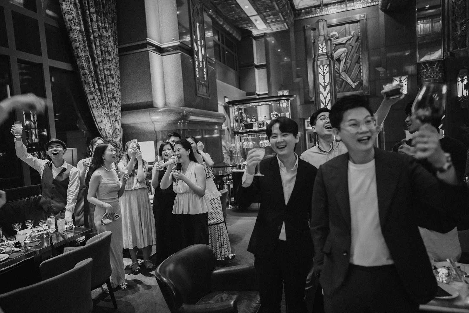 Jared and Xinyu's wedding party celebrates at Atlas Bar Singapore