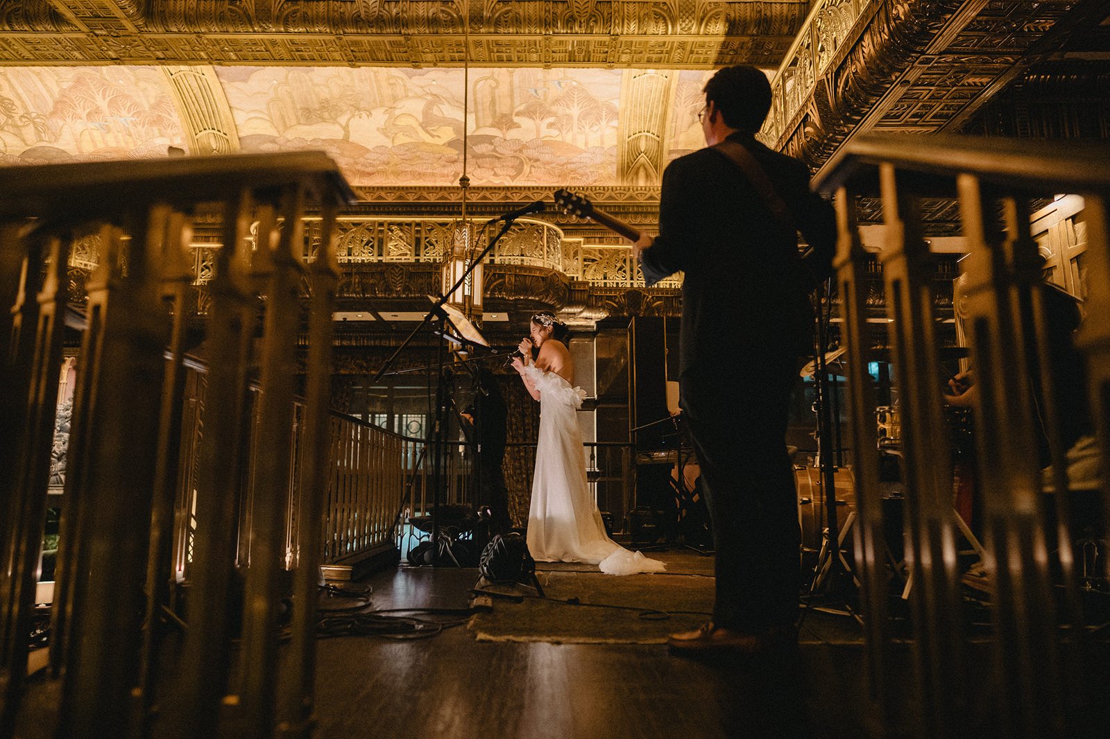 Bride and groom perform at Atlas Bar Singapore wedding reception
