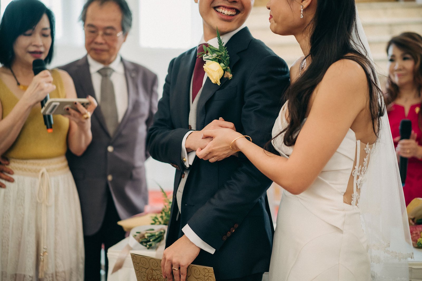 Wedding ceremony with bride, groom, and officiant