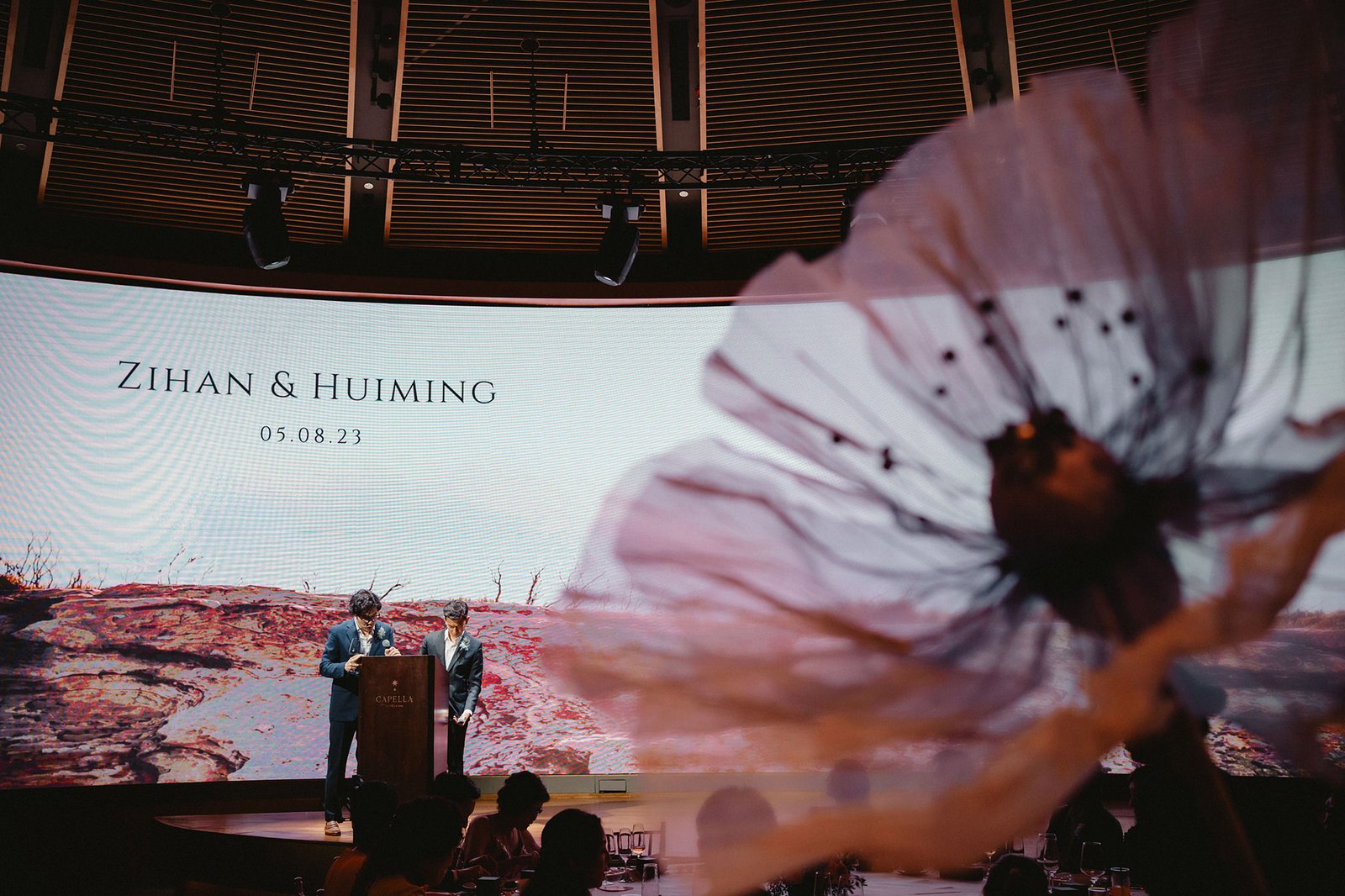 Zihan & Huiming wedding at Capella Singapore, speakers at podium