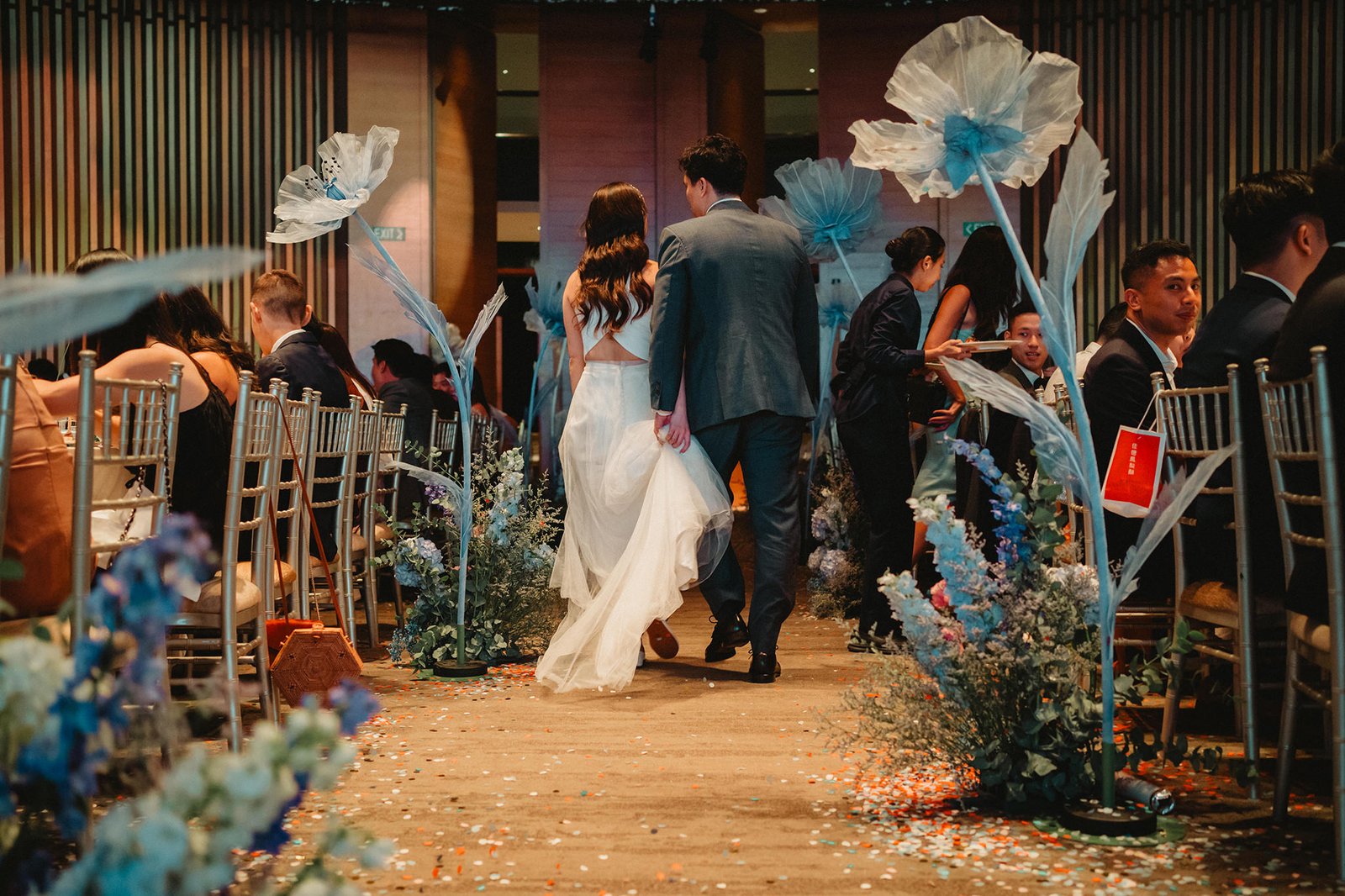 Newlyweds walk down aisle at Capella Singapore wedding