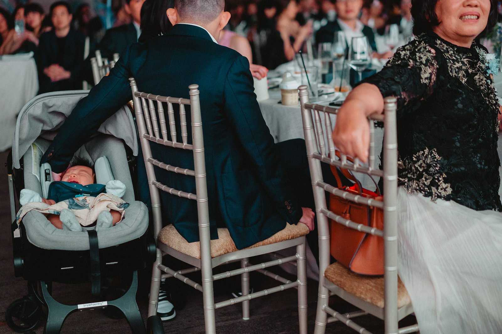 Baby in stroller at Capella Singapore wedding reception
