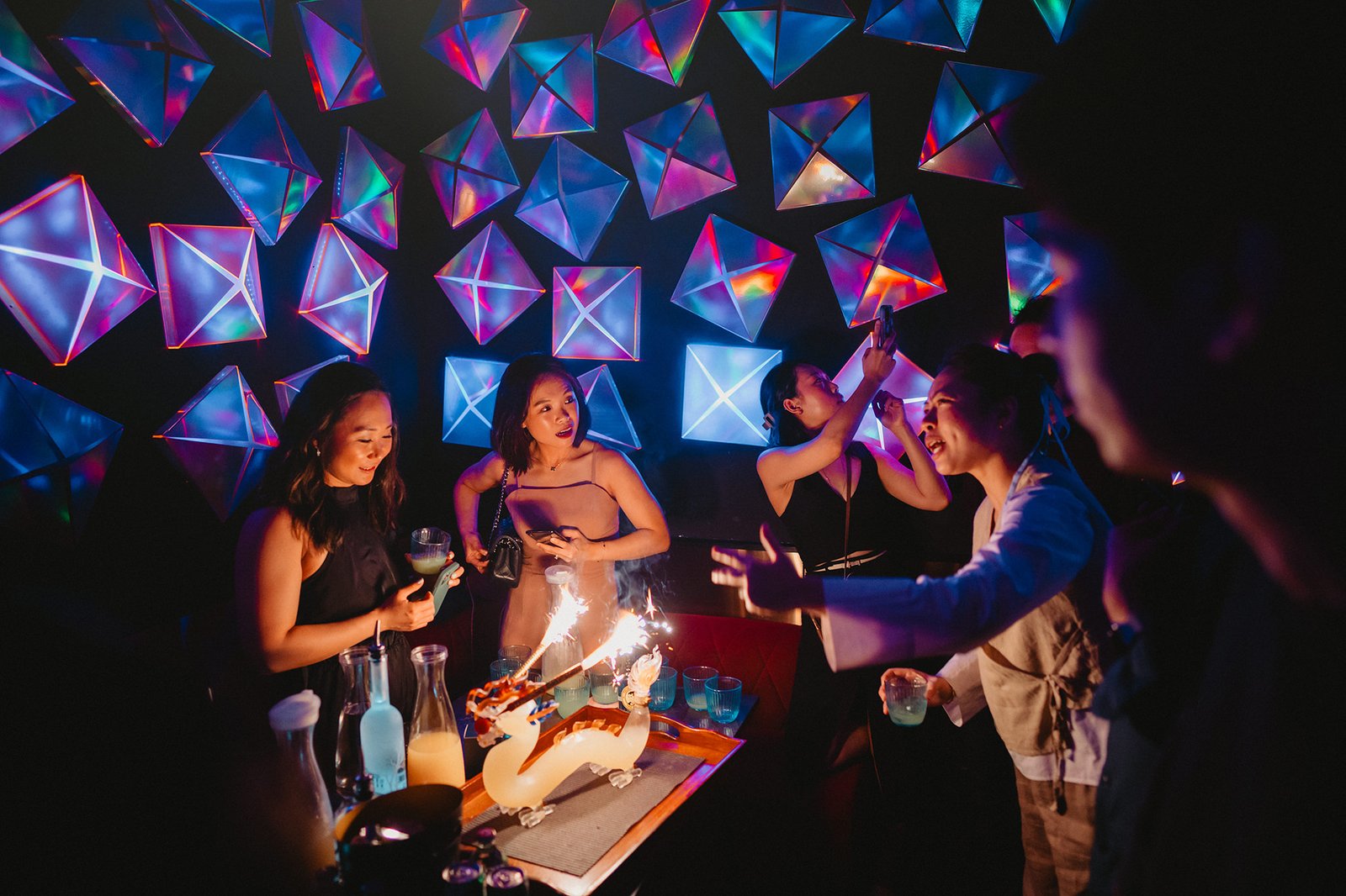 Capella Singapore wedding: Friends celebrate with dragon cake and glowing decor