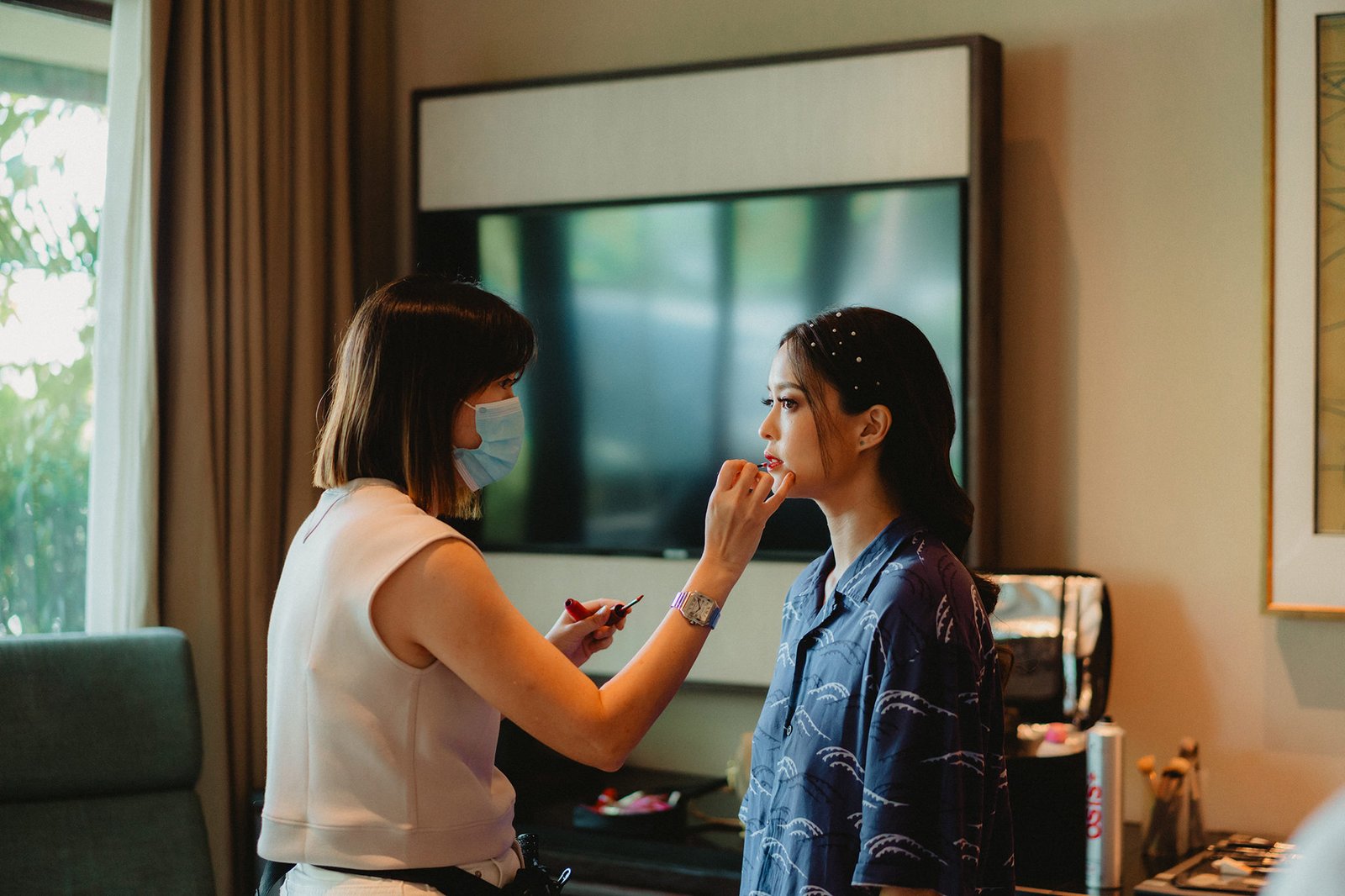 Bridal makeup application at Capella Singapore wedding