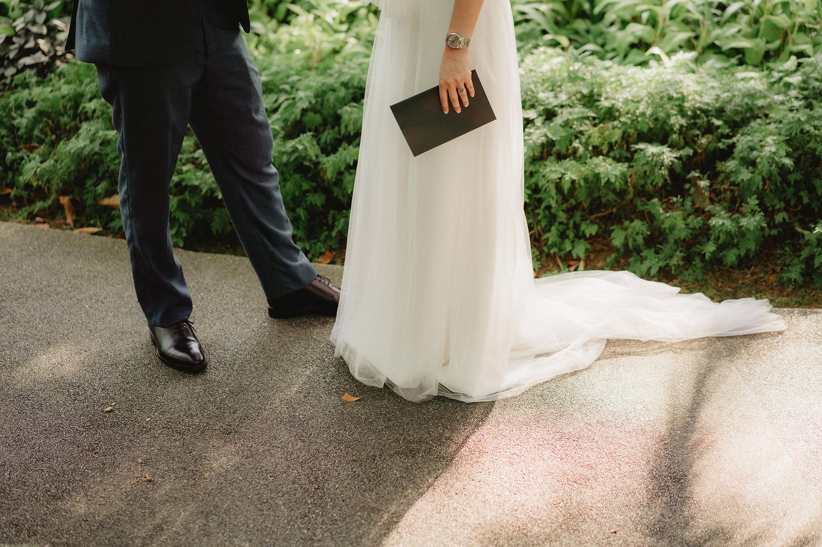 Han and Ming's Capella Singapore wedding: bride and groom detail shot