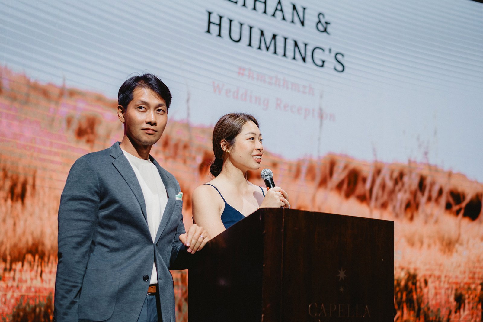 Han and Ming's wedding reception at Capella Singapore, with text on screen