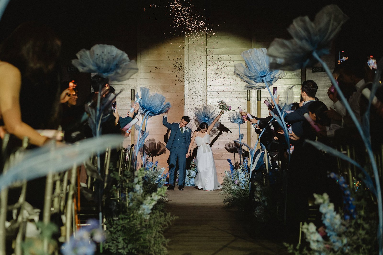 Han and Ming's Capella Singapore wedding: confetti toss and floral aisle