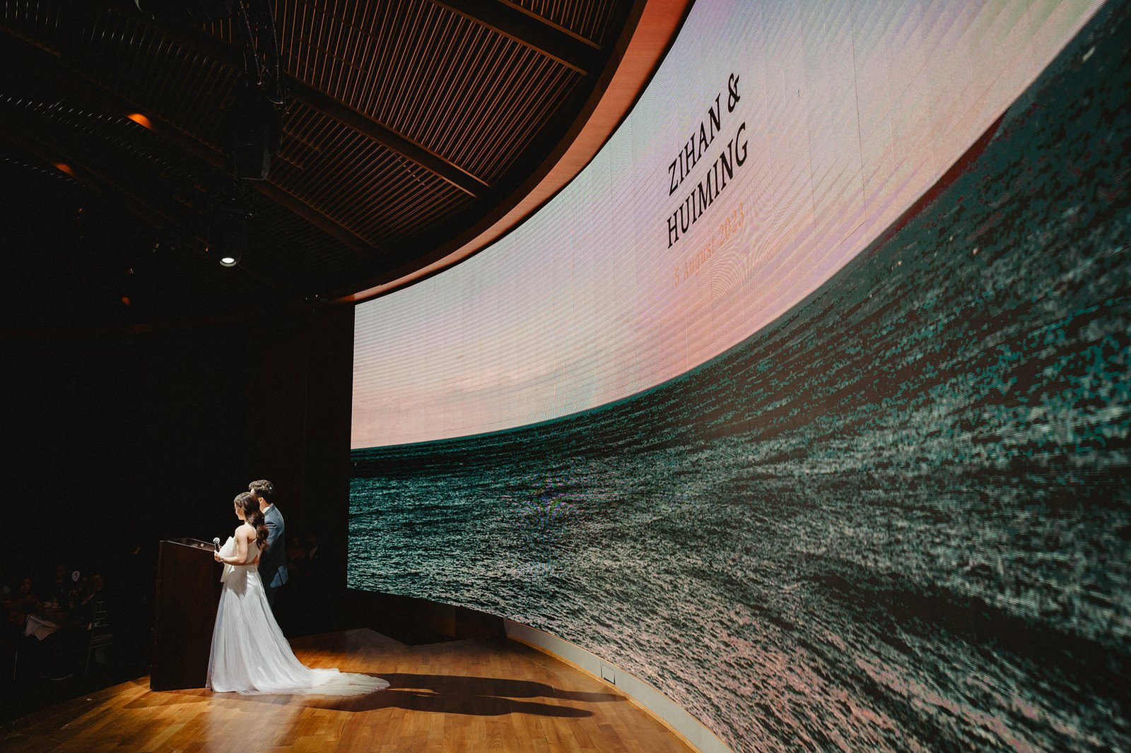 Zihan & Huiming wedding ceremony at Capella Singapore, couple at podium