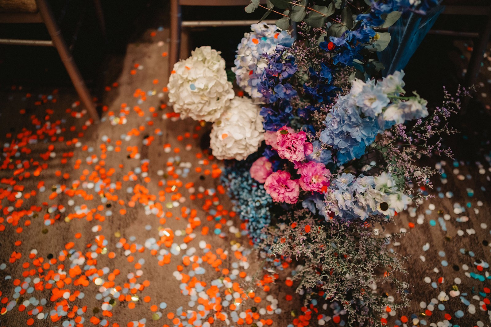 Capella Singapore wedding: colorful confetti and floral arrangement