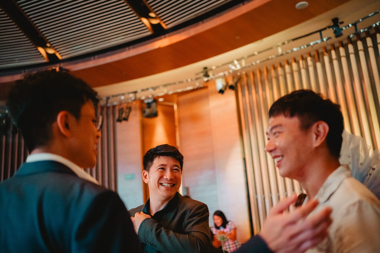 Groomsmen smiling at Capella Singapore wedding